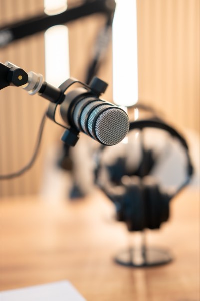 Close-up of a RØDE podcast microphone