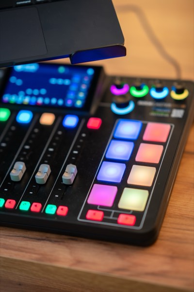 Colourfully backlit RØDECaster mixing desk